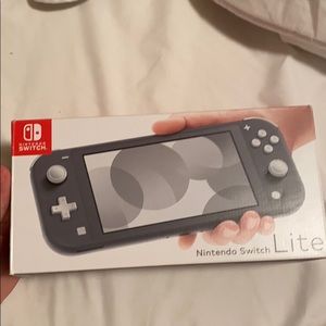 Nintendo Switch Lite. WILLING TO NEGOTIATE